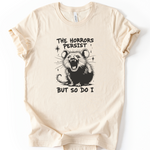 The Horrors Persist But So Do I T-Shirt in Heather Natural