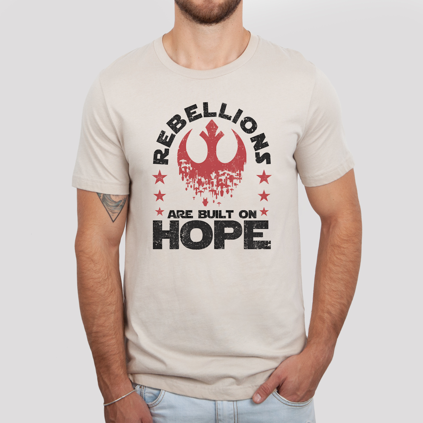 Rebellions Are Built On Hope T-Shirt in Heather Natural